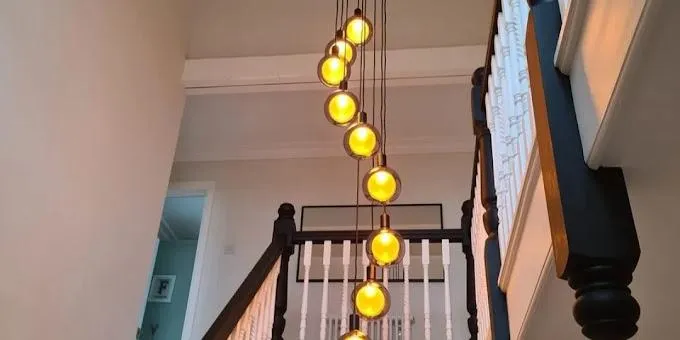 Professional stairwell lighting installation in a period Cardiff home