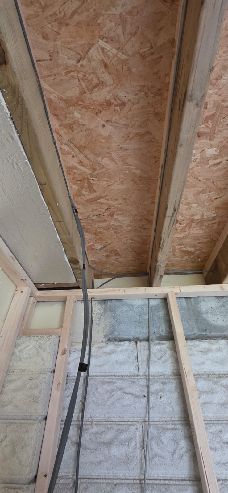 Cable runs through extension ceiling joists