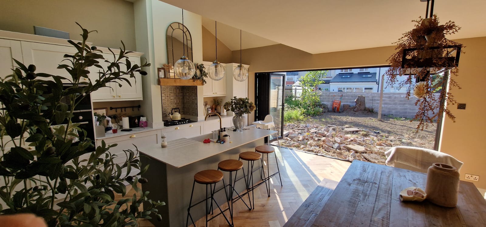 Completed kitchen extension with pendant lighting installed by Cardiff Electrical