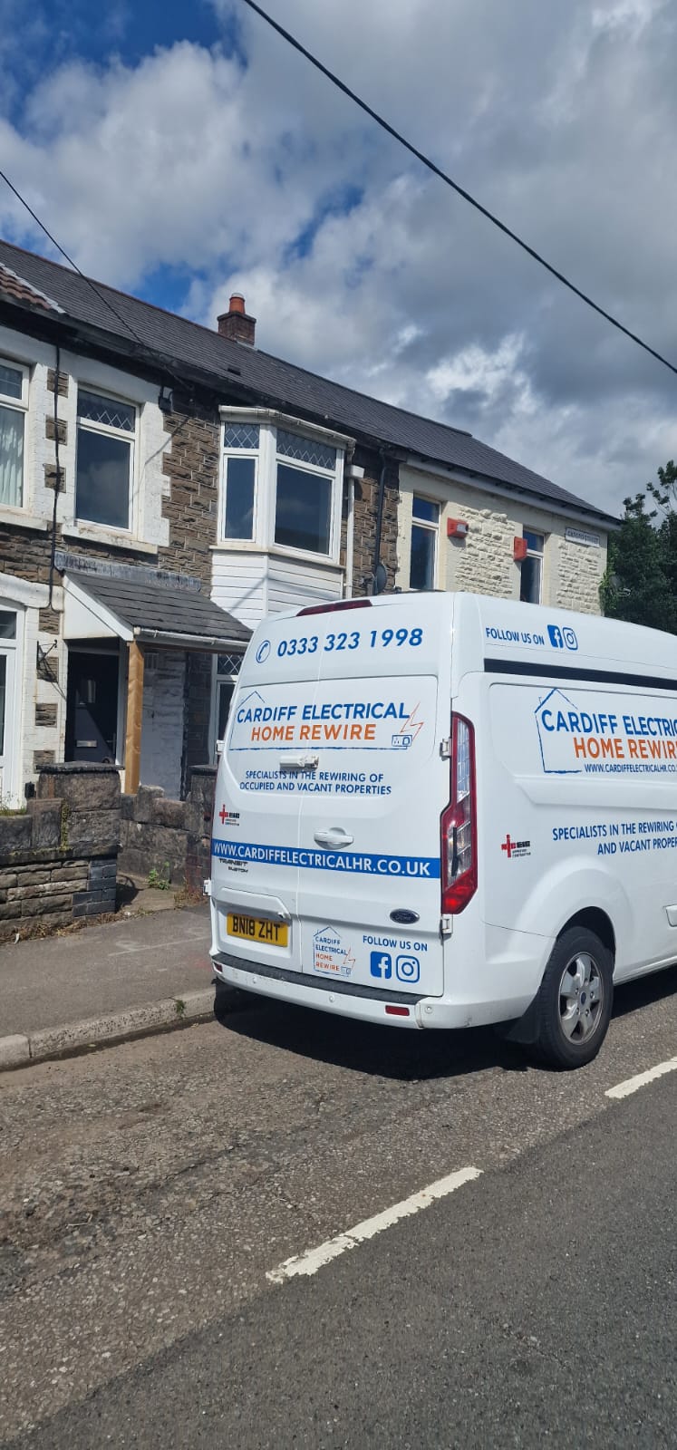 Cardiff Electrical van parked in a Pontypridd terrace street for electrical work
